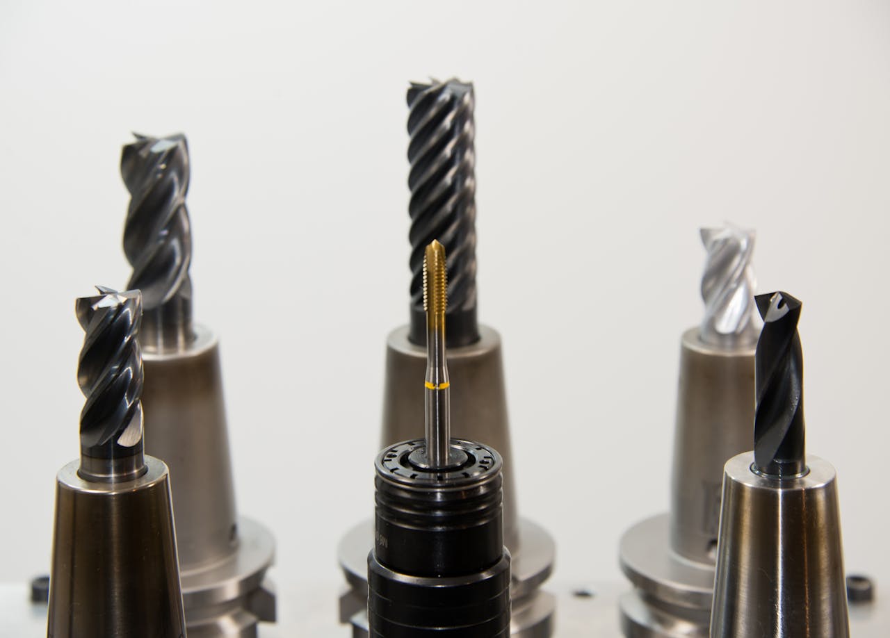A detailed view of different drill bits used in industrial machining applications.